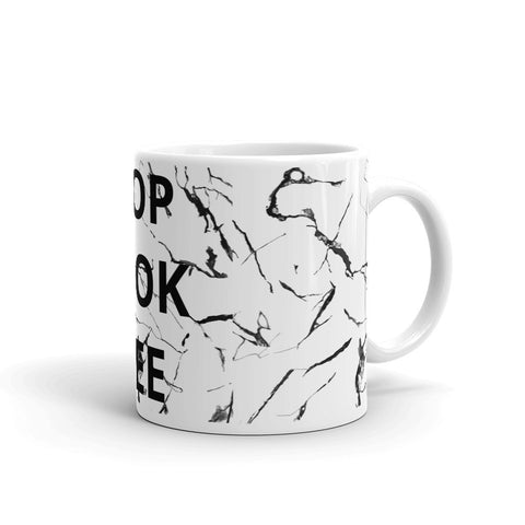a coffee mug with a picture of a cat 